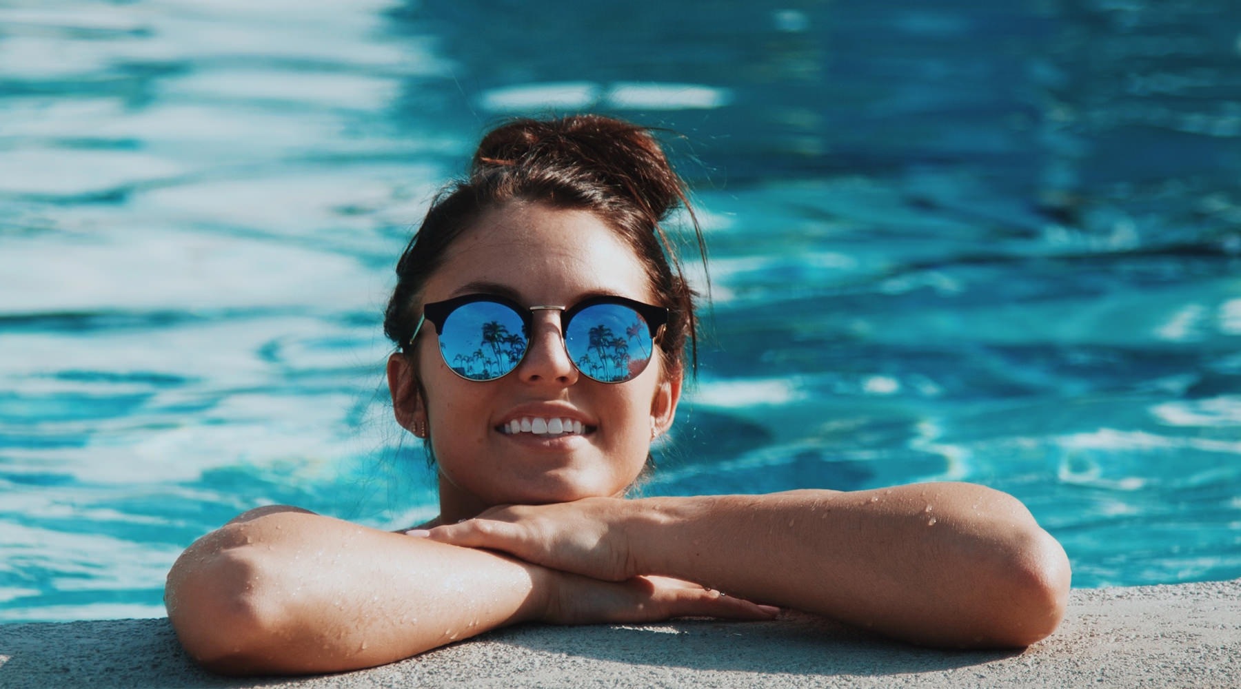 Woman in a sparkling pool